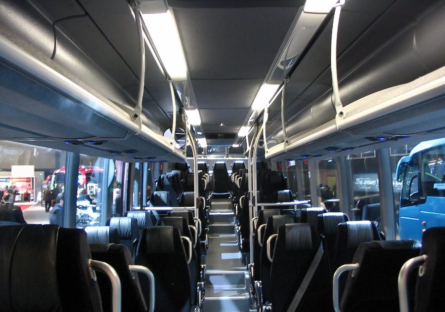 Intercity bus interior with luggage racks